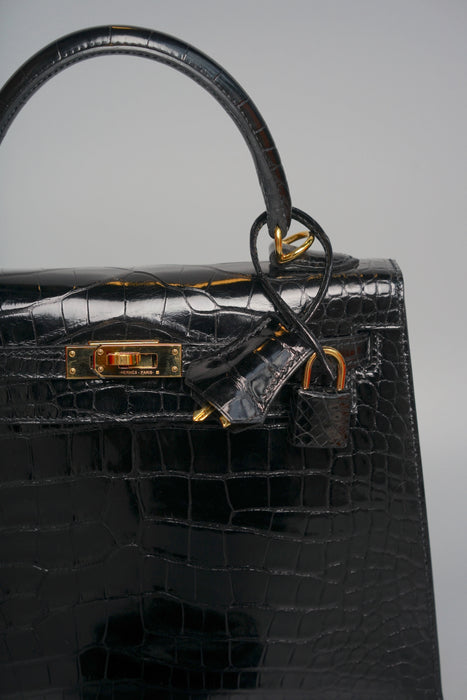 Hermes Kelly 25 in Black Shiny Alligator Ghw