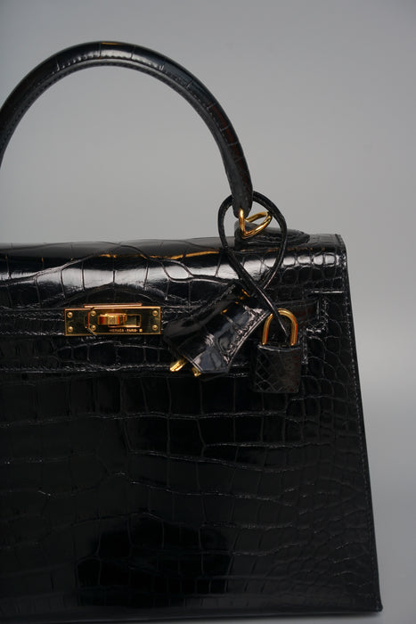Hermes Kelly 25 in Black Shiny Alligator Ghw