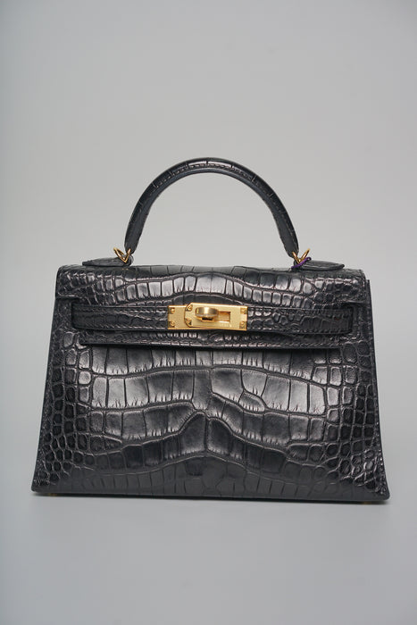 Hermes Kelly 25 in Black Shiny Alligator Ghw