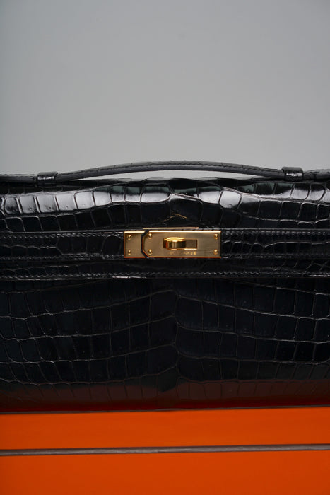 Hermes Kelly Cut in Noir Shiny Porosus Ghw