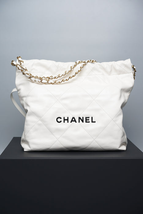 Chanel 22 in White Calfskin with Black Enamel Ghw