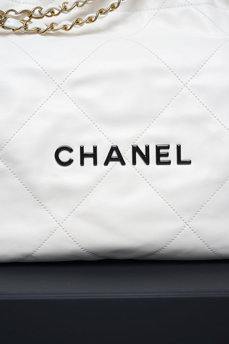 Chanel 22 in White Calfskin with Black Enamel Ghw