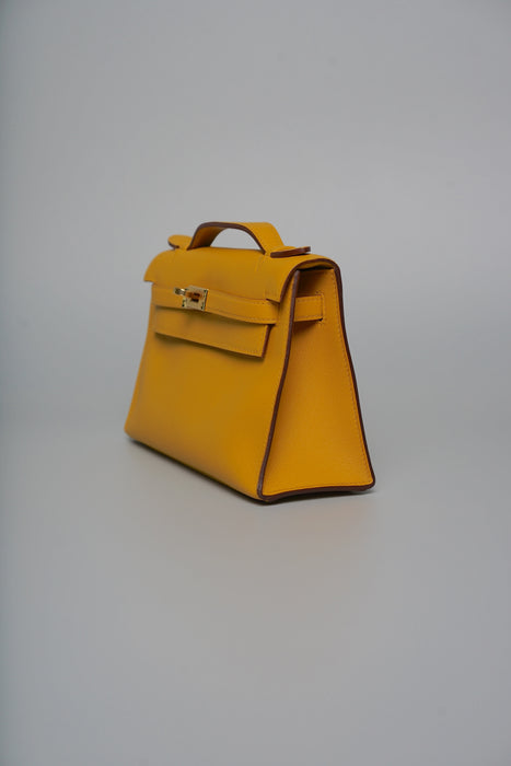 Hermes Kelly Pochette in Jaune Ambre Swift Ghw