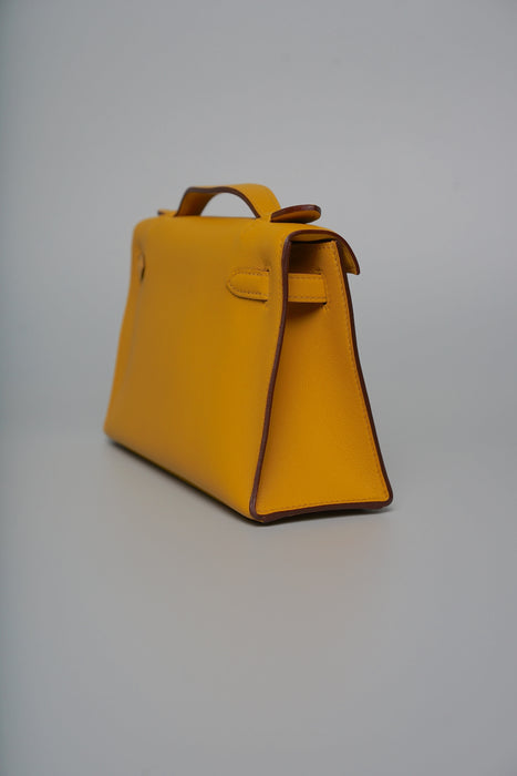 Hermes Kelly Pochette in Jaune Ambre Swift Ghw