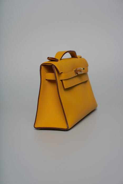 Hermes Kelly Pochette in Jaune Ambre Swift Ghw
