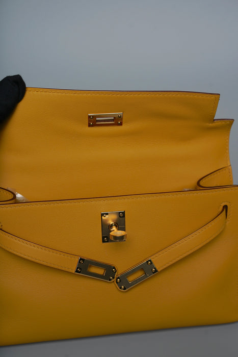 Hermes Kelly Pochette in Jaune Ambre Swift Ghw