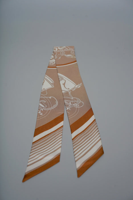Hermes "Ex-Libris Les Parisiennes" Twilly in Beige/White/Caramel (Brand New)