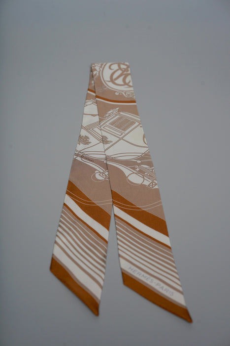 Hermes "Ex-Libris Les Parisiennes" Twilly in Beige/White/Caramel (Brand New)
