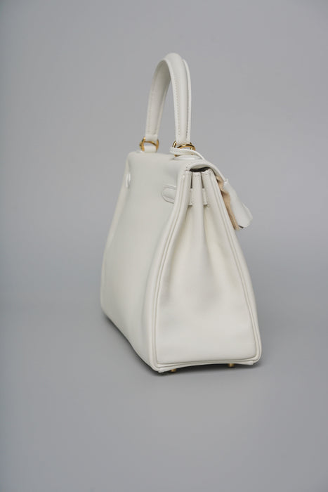 Hermes Kelly 25 in White Swift Ghw