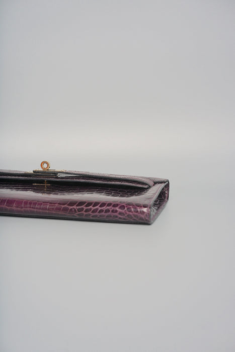Hermes Kelly Cut in Prunior Shiny Niloticus Permabrass