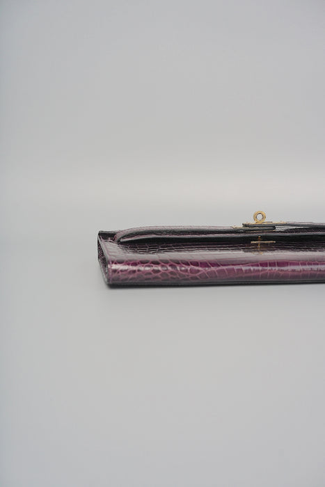 Hermes Kelly Cut in Prunior Shiny Niloticus Permabrass