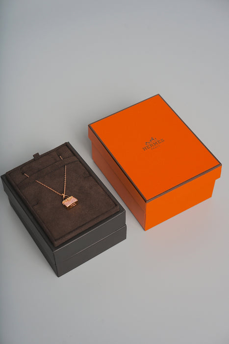 Hermes Amulettes Kelly Pendant in Rose Gold and Pink Sapphire (Brand New)