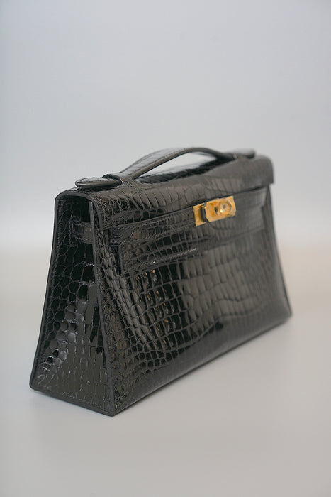 Hermes Kelly Pochette in Black Shiny Porosus Ghw