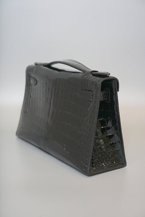 Hermes Kelly Pochette in Black Shiny Porosus Ghw