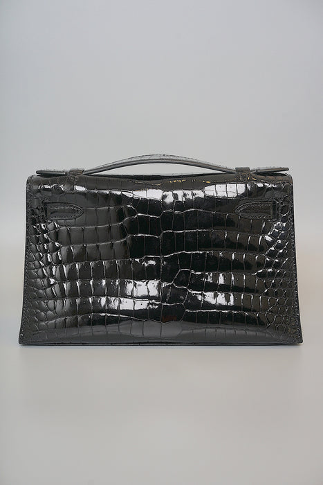 Hermes Kelly Pochette in Black Shiny Porosus Ghw