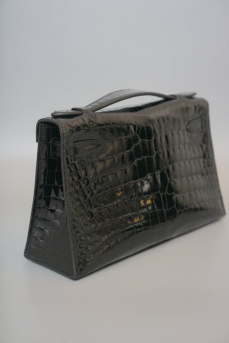 Hermes Kelly Pochette in Black Shiny Porosus Ghw
