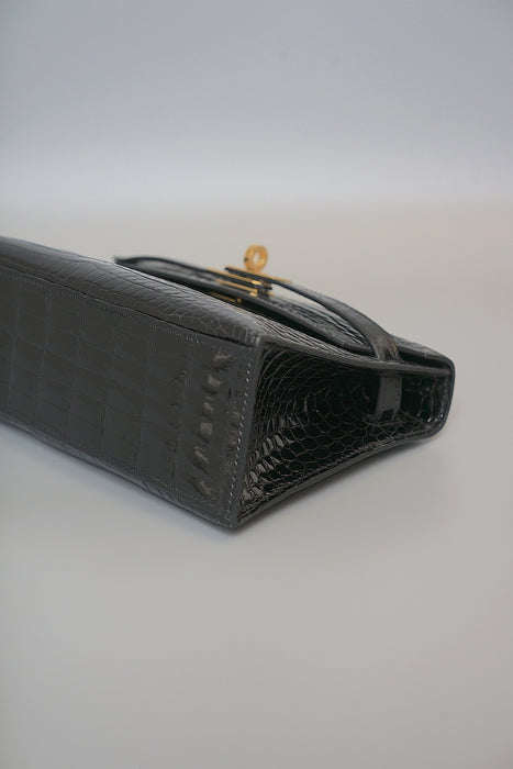 Hermes Kelly Pochette in Black Shiny Porosus Ghw