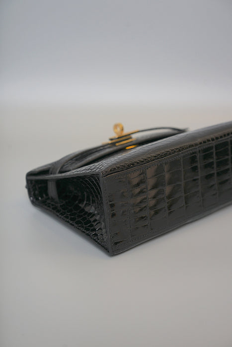 Hermes Kelly Pochette in Black Shiny Porosus Ghw