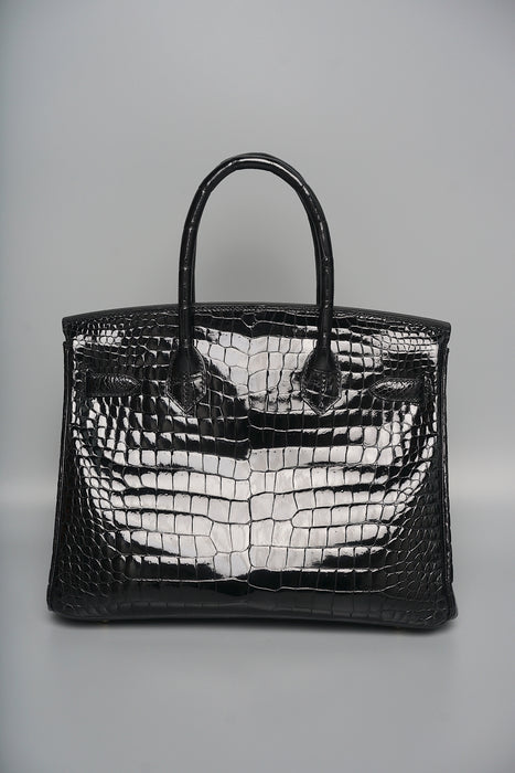 Hermes Birkin 30 in Black Shiny Porosus Ghw