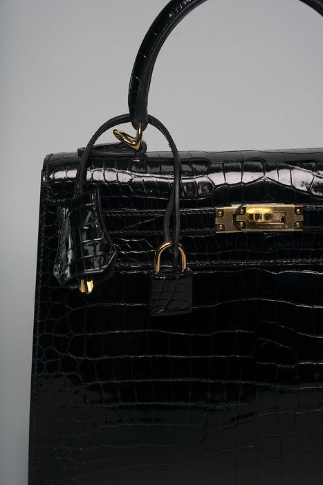 Hermes Kelly 25 in Black Shiny Porosus Ghw (Brand new)