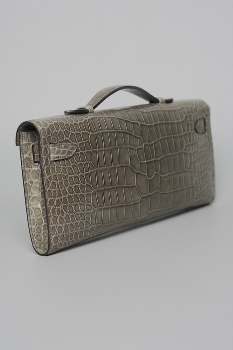 Hermes Kelly Cut in Gris T Shiny Porosus Phw