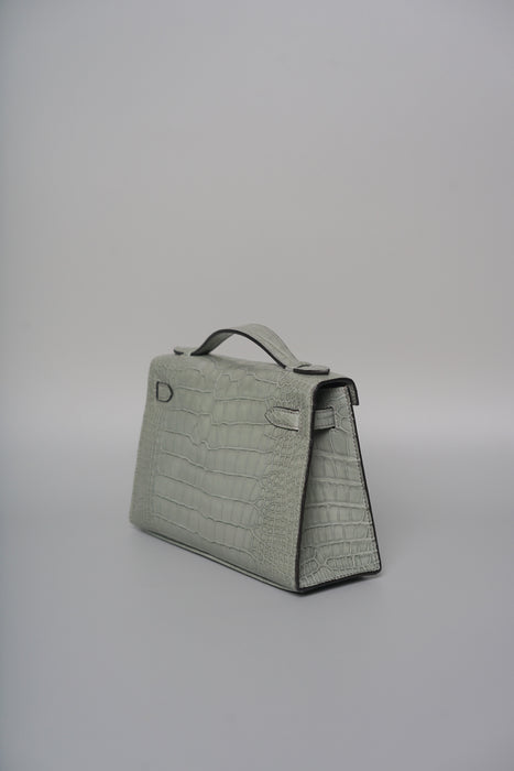 Hermes Kelly Pochette in Gris Ciment Matte Alligator Phw (Brand New)