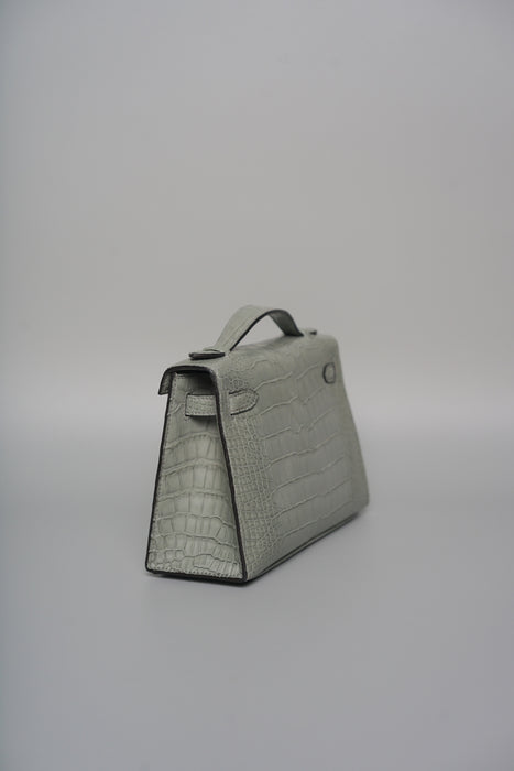 Hermes Kelly Pochette in Gris Ciment Matte Alligator Phw (Brand New)