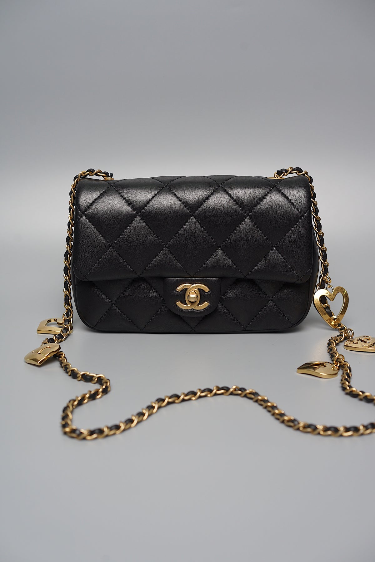 Chanel Black Quilted Mini Flap with Heart Charms (Brand New)– orangeporter