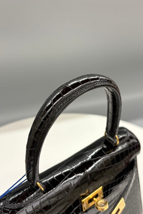 Hermes Kelly 20 Vintage in Black Shiny Porosus Ghw