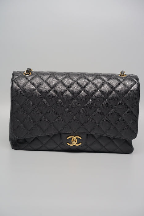 Chanel Maxi Double Flap in Black Caviar Ghw