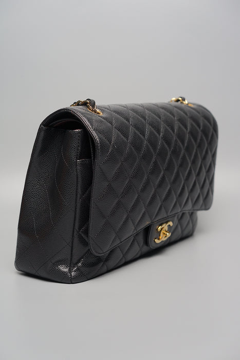 Chanel Maxi Double Flap in Black Caviar Ghw