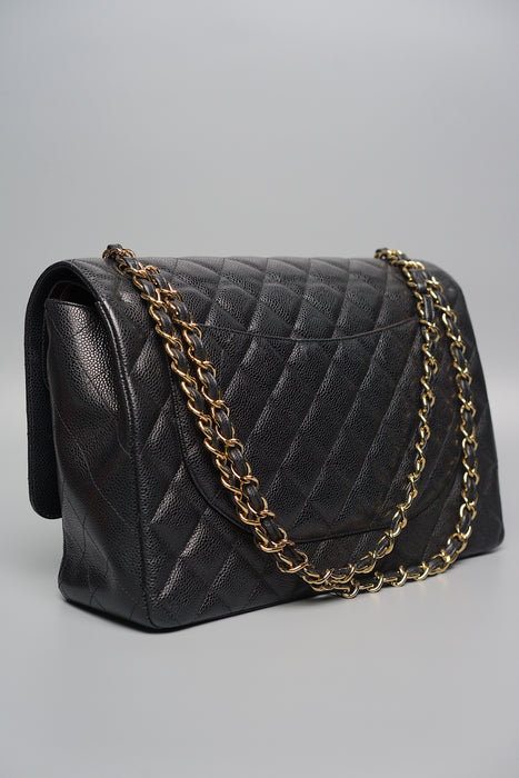 Chanel Maxi Double Flap in Black Caviar Ghw