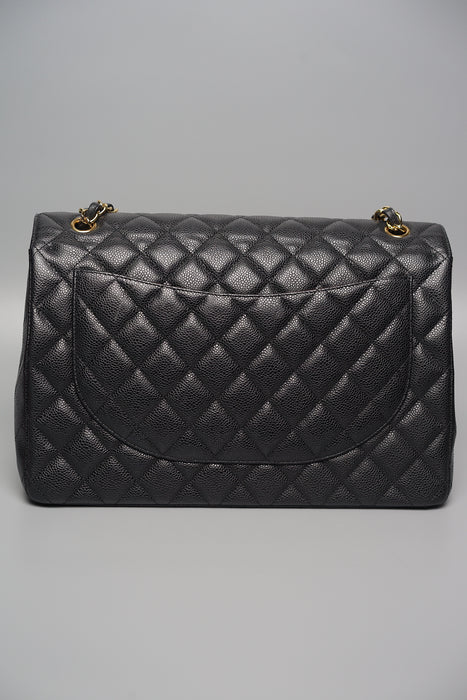 Chanel Maxi Double Flap in Black Caviar Ghw