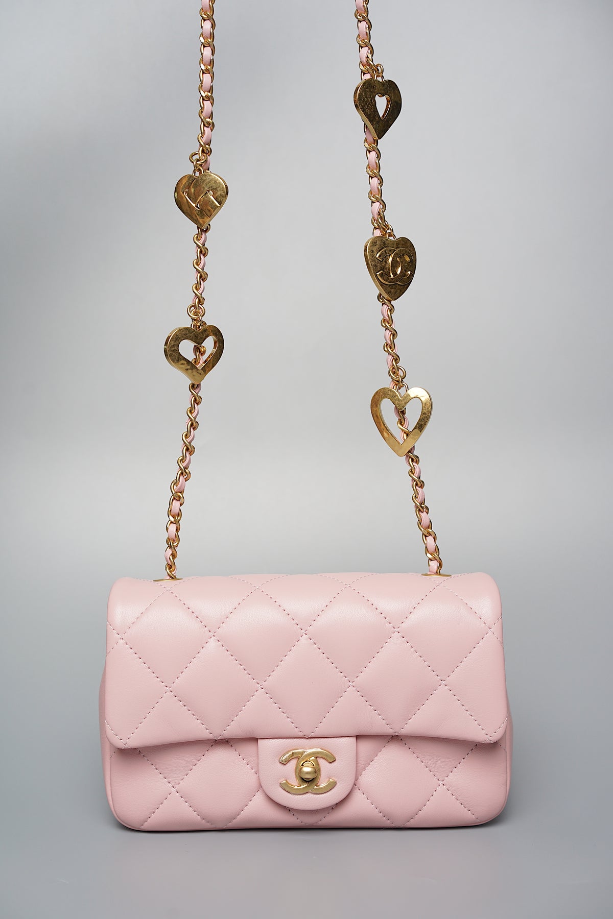 Chanel Pink Quilted Mini Flap with Heart Charms (Brand New